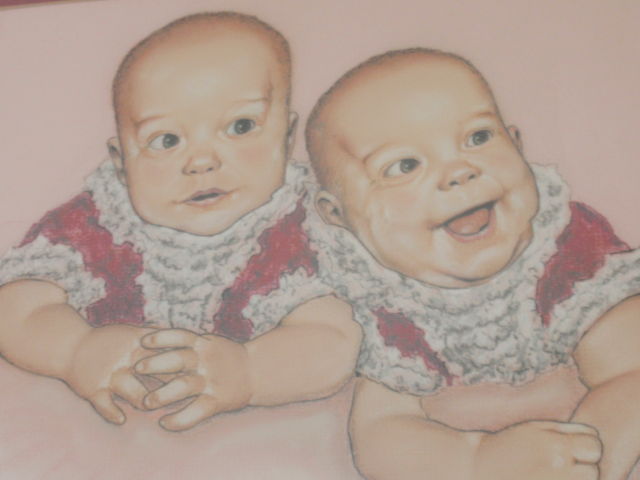 This is a painting that my Dad made of me and my twin sister when we were probably 4 or 6 months old?  Don't know which one I am though!