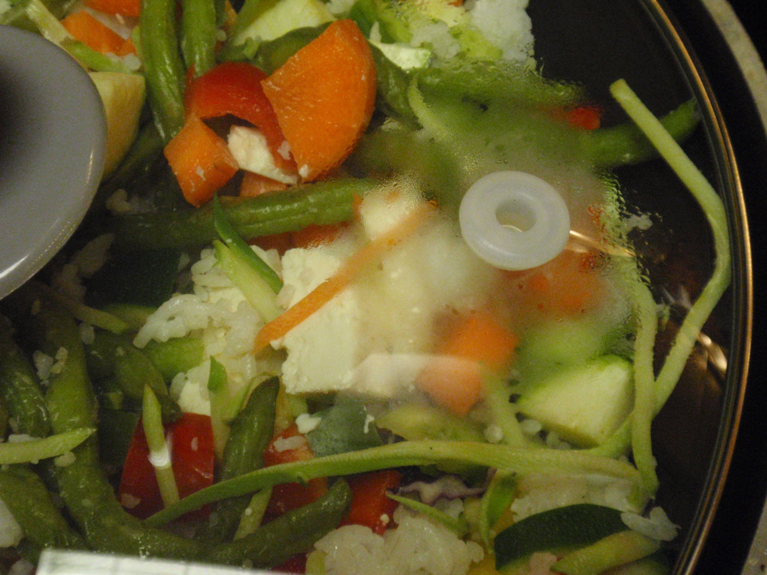 I steam the veggies on medium/high heat for 4 to 5 minutes before adding the stirfry sauce