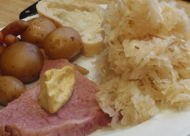 My 4 ounce slice of corned beef with a nice rounded teaspoon of Dijon mustard and just enough sauerkraut!