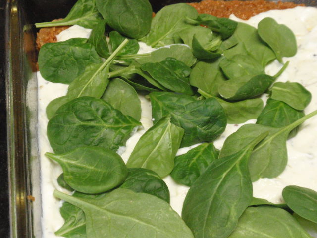 fresh spinach on half